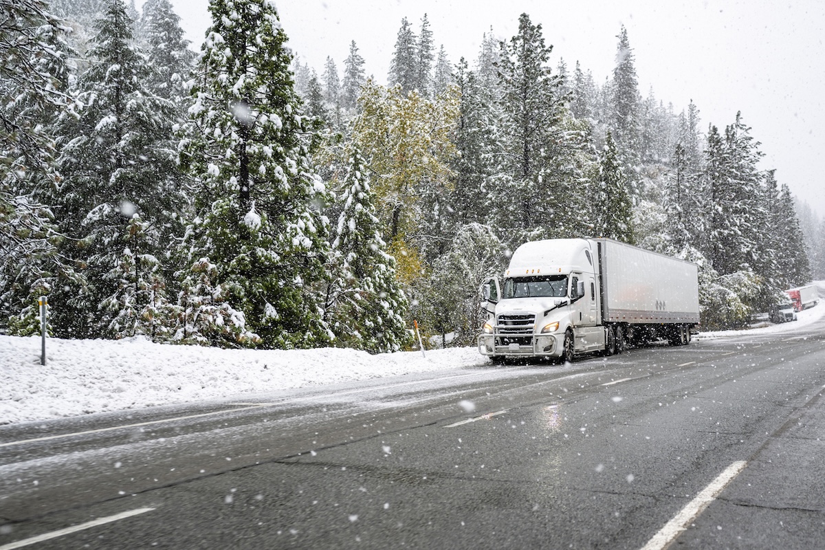 semi truck on snowy winter road